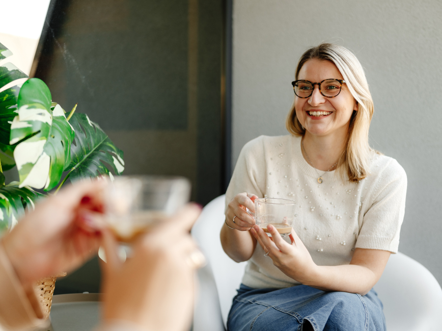 The team drinks coffee together, fostering collaboration and strengthening their bond.